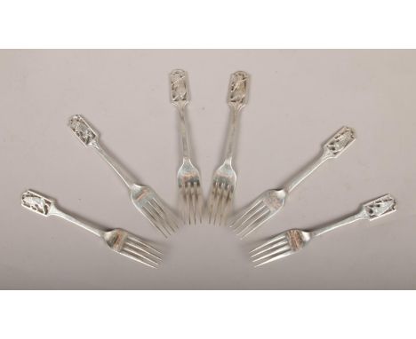 A set of six silver dessert forks with cat and fiddle openwork terminals, assayed Sheffield 1953. (114g).  