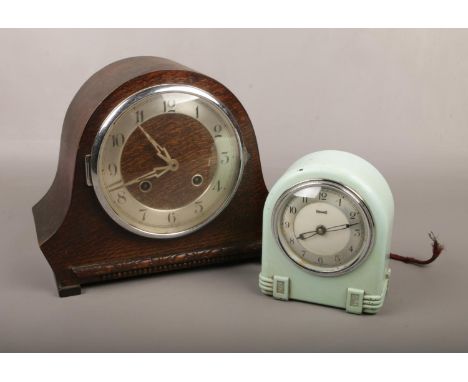 A vintage Ferranti electric clock, along with an oak cased mantle clock.  