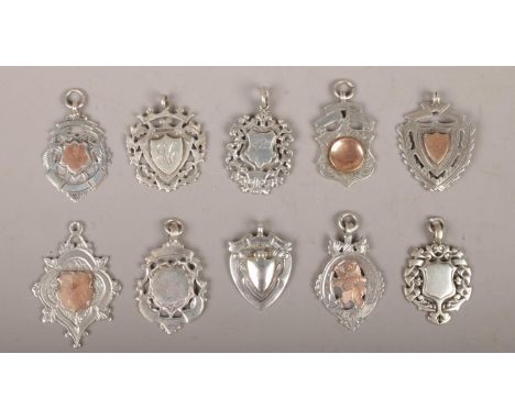 Ten silver pendants and medals to include Derbyshire junior league runners up medal etc, 89g.  