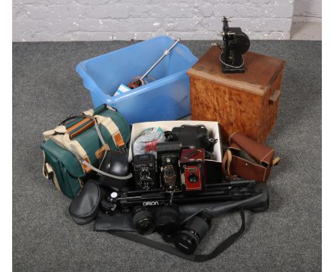 A collection of photographic equipment, to include Lubitell 166, Eastman Kodak Brownies, Duo Ensign, lenses, tripod etc.  