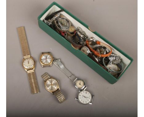 A box of manual wristwatches to include Timex, Oris, Sekonda, etc.  Mostly for spares or repair.