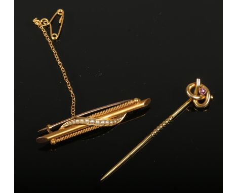 A 15ct gold and pearl bar brooch along with a 9ct gold and garnet Stafford knot stick pin.  