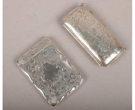 A Victorian silver card holder along with a silver purse, card holder assayed Chester 1896 by William Neale, 150g.  