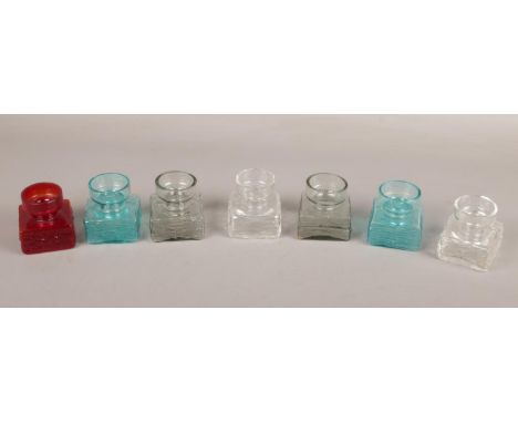 Seven small Dartington glass vases / candle holders of inkwell form with moulded bark texture by Frank Thrower. Shape FT98 in