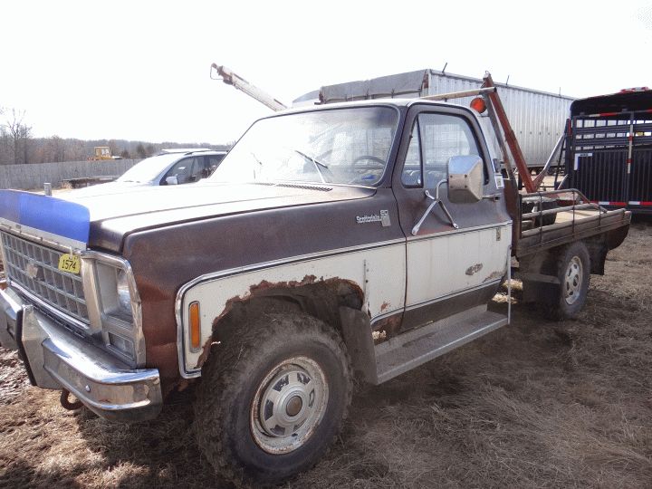 Lot 1574 1979 Chevy Flatbed Truck Bale Bed, Bale Spear and New Bale Wench, Title in the Office
