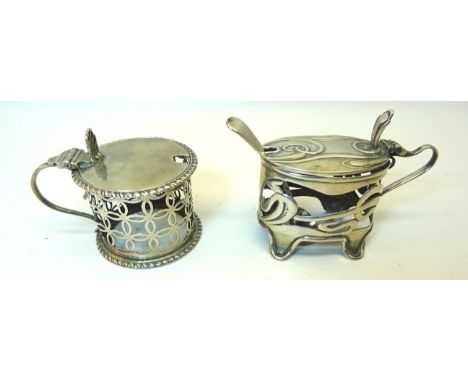 An Edwardian silver Mustard Pot of Art Nouveau oval design, Birmingham, 1905, maker Levi & Salaman, a spoon by the same maker