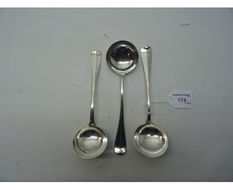 A pair of Edwardian silver rat tail pattern Sauce Ladles, London, 1907, maker William Hutton and Sons and a single rat tail s