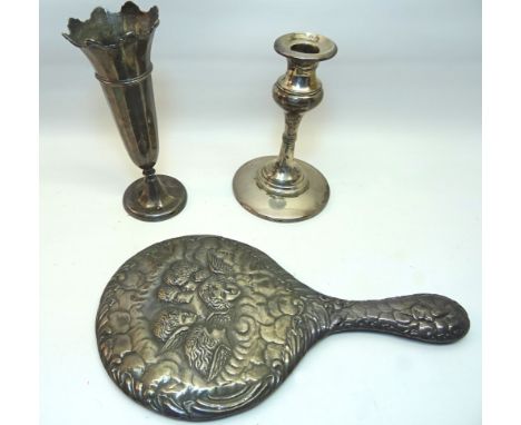 A silver trumpet shape Vase, Birmingham, 1928,  7" (17cms) high, a single silver table candlestick and a silver backed hand m