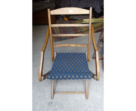 A beech frame Folding Chair with ladder back. 