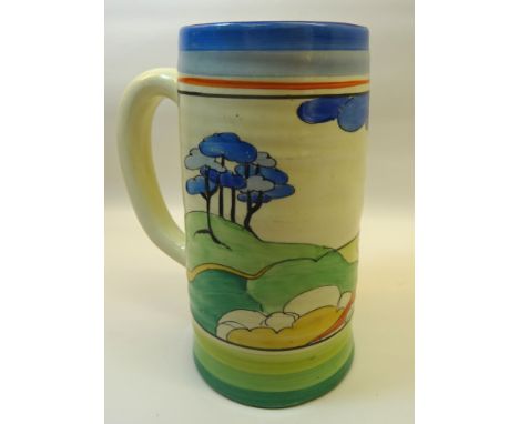 A Newport pottery Clarice Cliff Bizarre Mug decorated with the Blue Firs pattern.  6" (15cms) high.