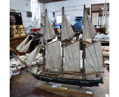 A SCRATCH BUILT OR KIT MODEL OF A THREE MASTED SCHOONER with sails and rigging, 30" long