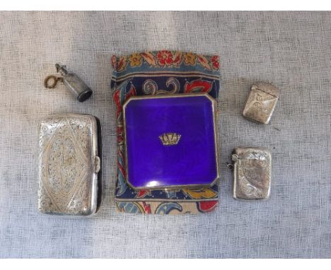 AN ENAMEL AND SILVER COMPACT, the lid decorated with a coronet on a blue enamel ground, silver cigarette case, two vesta case