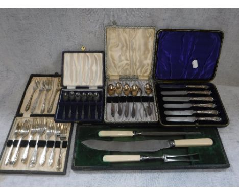 A COLLECTION OF SILVER PLATED FLATWARE in presentation cases