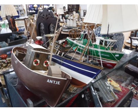 A SCRATCH BUILT OR MODEL OF A TRAWLER BOAT and three other similar model boats (4)