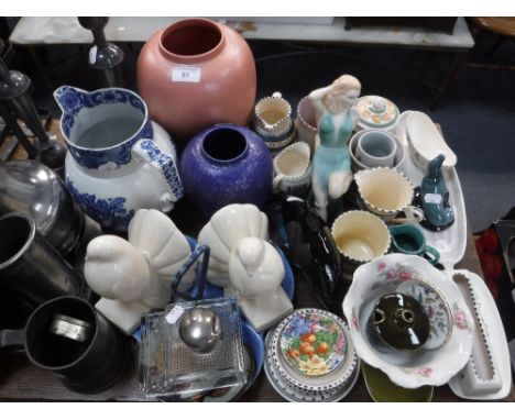 A COLLECTION OF POOLE POTTERY, to include a dolphin and a mottled pink vase with a collection of decorative ceramics