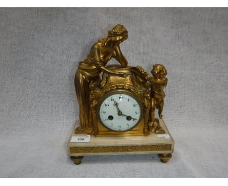 A 19TH CENTURY FRENCH ORMOLU MANTEL CLOCK decorated with a woman receiving a garland from a cherub, with a white enamel dial 
