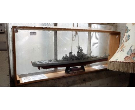 A KIT MODEL OF THE US BATTLESHIP 'BB-62, NEW JERSEY', contained in a wooden display box, the boat, 30" long