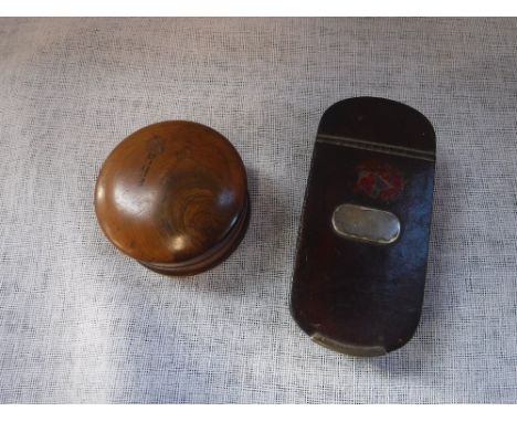 A 19TH CENTURY PAPIER MACHE AND LACQUERED SNUFF BOX and a turned-wood pot and cover (2)