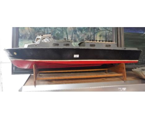A SCRATCH BUILT OR KIT MODEL OF A HOUSEBOAT, 45" long