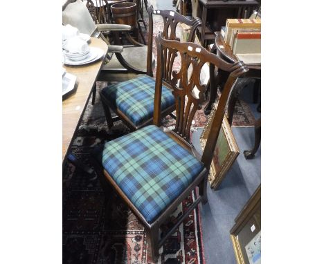 A SET OF FOUR GEORGE III MAHOGANY DINING CHAIRS with Chippendale style pierced back-splats and drop-in seats