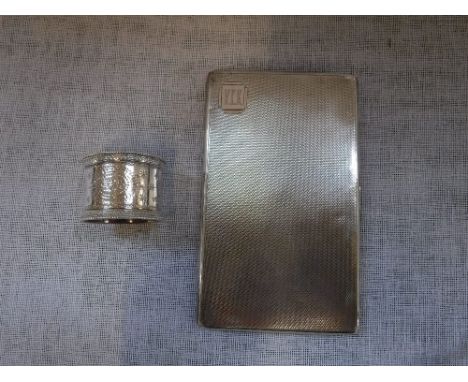 A SILVER CIGARETTE CASE with engine-turned decoration and a silver napkin ring (2)