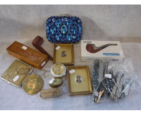 AN INDO-PERSIAN PAINTING on mother-of-pearl and its companion, a collection of corkscrews, tobacco pipes and other items
