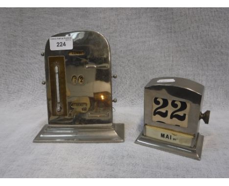 A STEEL DESK CALENDAR and one other similar with thermometer (2)