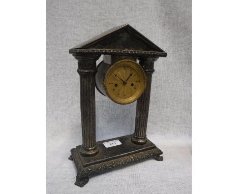 A SILVER PLATED MANTEL TIMEPIECE, the movement and dial held within a classical architectural arch on an embellished base, wi