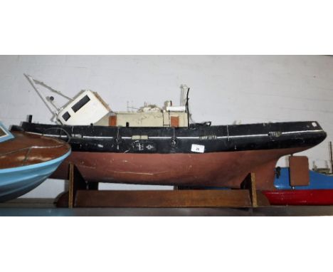 A SCRATCH BUILT OR KIT MODEL OF A BOAT with an upper deck, 44"