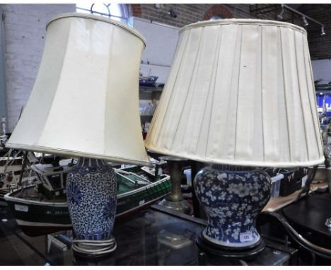 AN ORIENTAL BLUE AND WHITE BALUSTER SHAPED VASE converted to a table lamp and another similar 