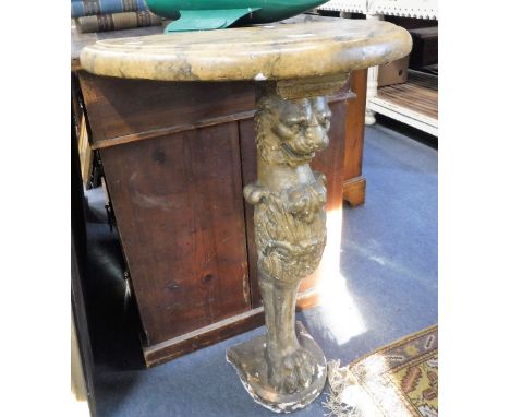 A REGENCY LION MONOPODIA CONSOLE TABLE, the composition marble effect 'D'-shaped top on a lion head stand and platform base, 