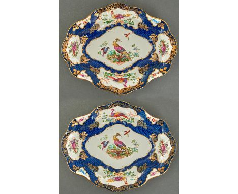 A pair of Booth's earthenware Worcester style shaped oval dishes, early 20th c, printed and painted with reserves of birds an