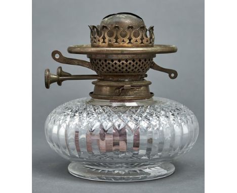 An Edwardian squat cut glass oil lamp on star cut foot, c1910, with contemporary Dietz Davis &amp; Co Limited brass Duplex bu
