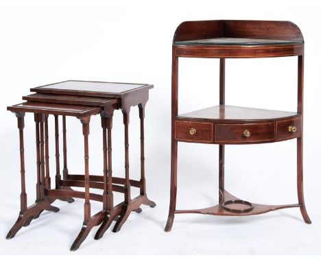 A George III mahogany corner washstand, c1800, boxwood strung, the upper tier with one large and two small apertures above a 