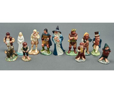 A Royal Doulton Lord of the Rings display stand designed by Harry Sales, of rustic branch and platform form, 43cm w, printed 