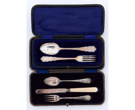 A George V silver child's spoon, fork and&nbsp;bone hafted knife, by James Deakin &amp; Sons, Sheffield 1915 and 16, cased an