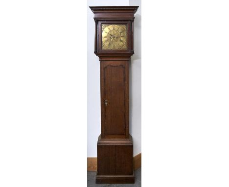 A George III oak longcase clock, the flared cornice Greek key carved above shallow frieze, the door enclosing a 30cm square b