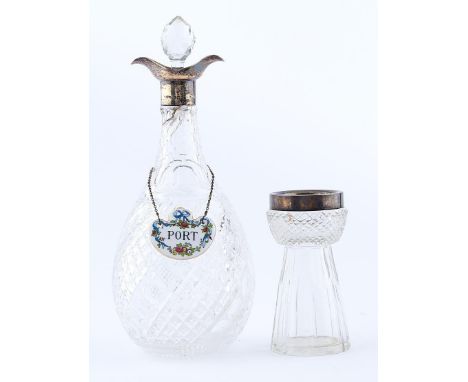 A George V silver mounted cut glass decanter and stopper, double lipped, 27cm h, by John Grinsell &amp; Sons, Birmingham 1912