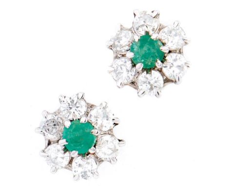 A pair of emerald and diamond cluster earrings, in 18ct white gold, 11mm, import marked, probably Birmingham 1979, 3.2g  Ligh