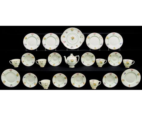 A Royal Doulton tea service,&nbsp; comprising teapot, six cups, eight saucers, six plates and a bread and butter plate, each 