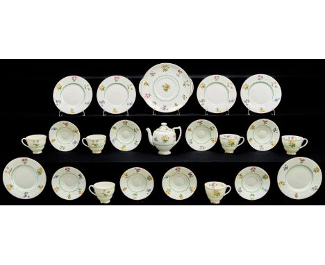 A Royal Doulton tea service,&nbsp; comprising teapot, six cups, eight saucers, six plates and a bread and butter plate, each 