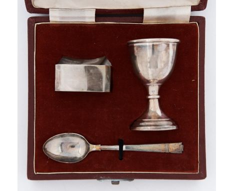 A George VI silver child's egg cup, spoon and napkin ring, egg cup 70mm h, by Deakin &amp; Francis, Birmingham 1948 and 51, c