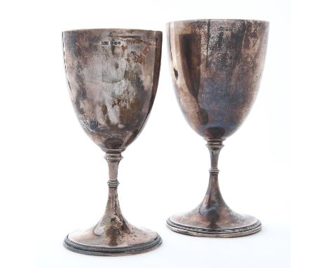 Two George V silver cups, goblet form with beaded foot, 16.5cm and 18cm h, by James Dixon &amp; Sons Limited, Sheffield 1913 