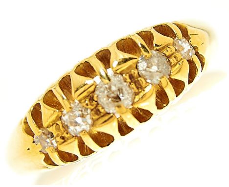 A five stone diamond ring in 18ct gold, Birmingham 1911, 3.4g, size J½  Light wear consistent with age, largest diamond with 