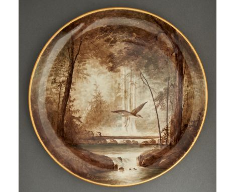 A Copeland wall plaque, 1879, painted by William Yale, signed, with a heron in a wood, the rim gilt, 36.5cm diam, impressed m