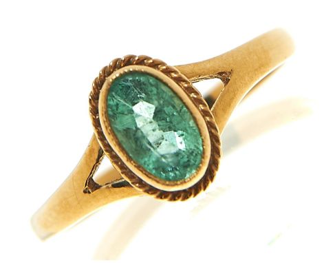 An emerald ring in 9ct gold, marks rubbed, 1.4g, size L½  Good condition