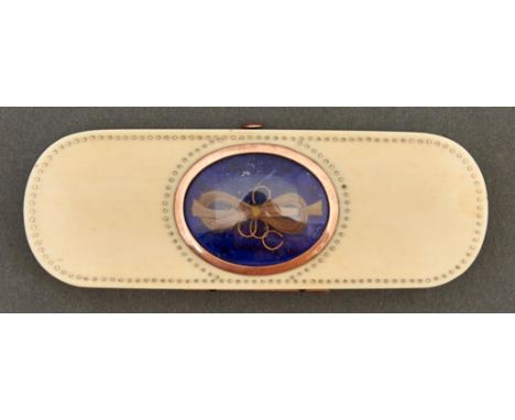 A George III ivory and pique point toothpick box, c1800, the lid inset with hair tied in a bow by gold wire on blue glass in 