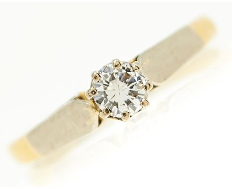 A diamond solitaire ring, the round brilliant cut diamond of approximately 0.20ct, gold hoop marked 18ct plat, 1.6g, size I  