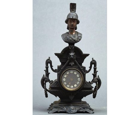 A French Greco-Roman revival mantel clock, late 19th c, with bust of Athena above arched pediment set with grotesque mask and