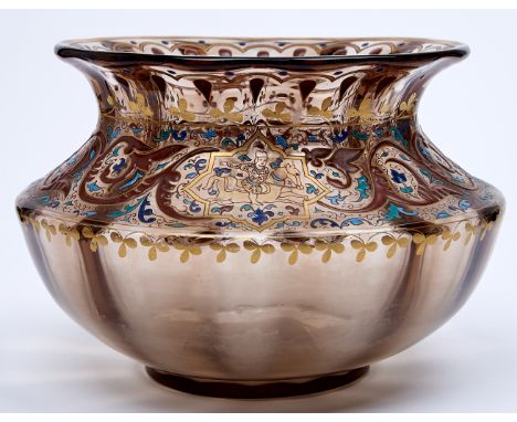 A Galle orientalist enamelled glass bowl, c1880, decorated around the cavetto with mounted Islamic warriors in medallions of 